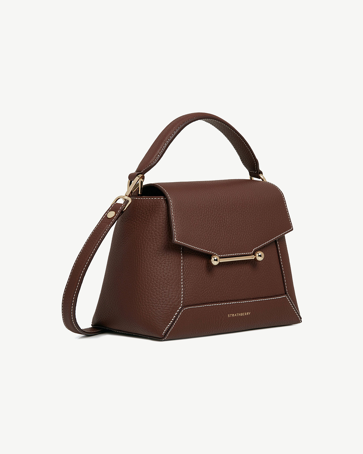 Chocolate leather bag with vanilla stitching, top handle, gold hardware, Strathberry logo.
