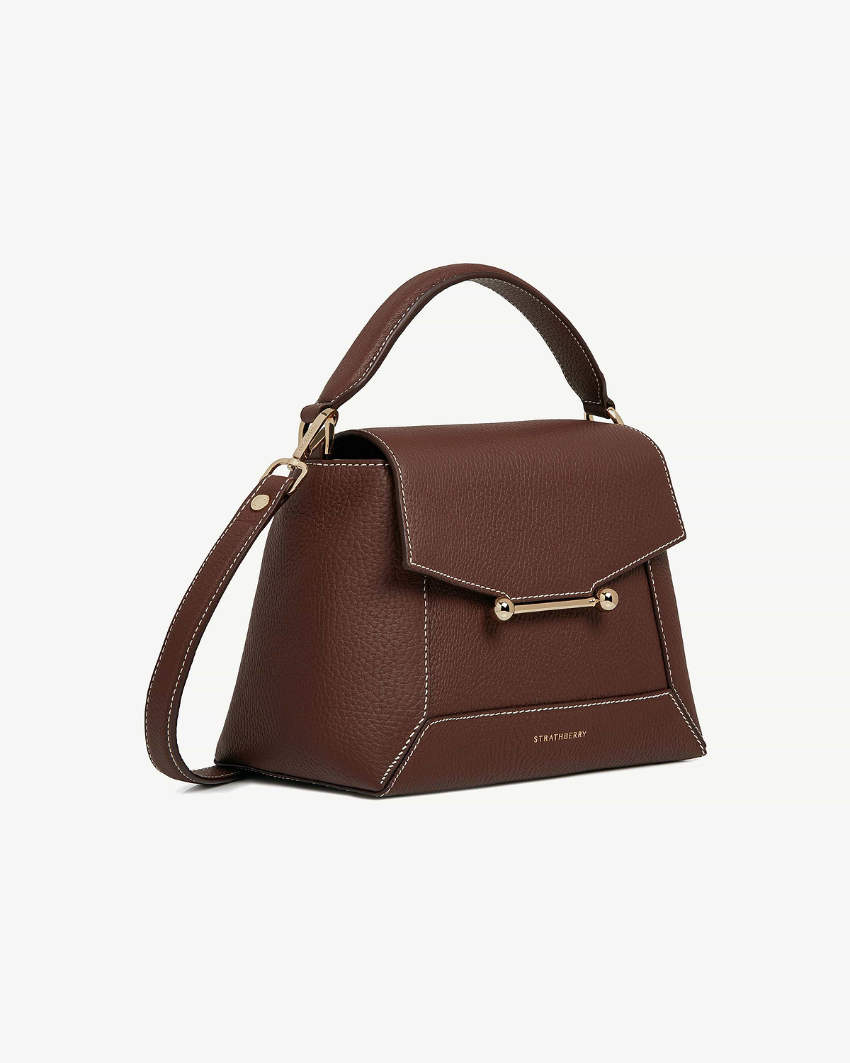 Chocolate leather bag with vanilla stitching, top handle, gold hardware, Strathberry logo.