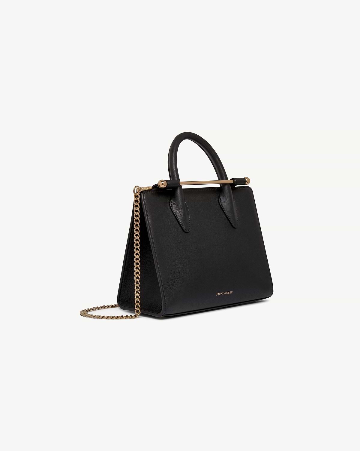 Black Strathberry mini tote with top handles and gold chain shoulder strap.