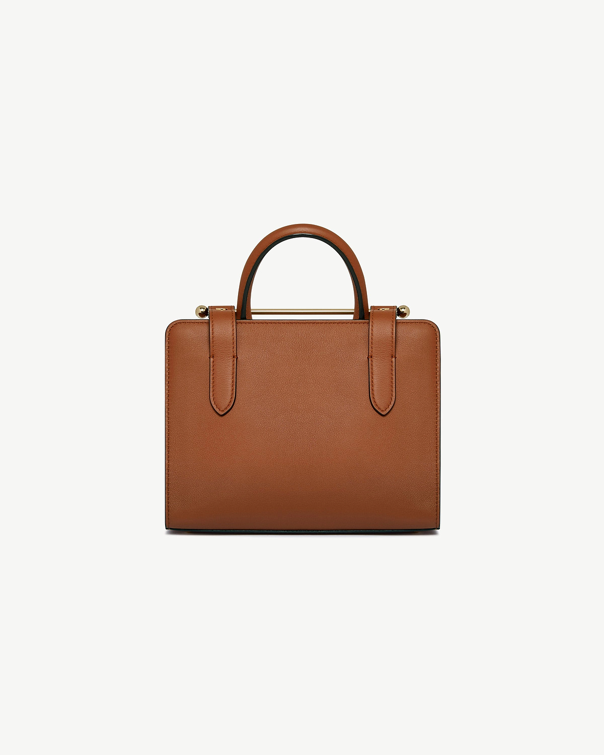 Chestnut mini tote with rounded top handles and gold bar hardware, front view.