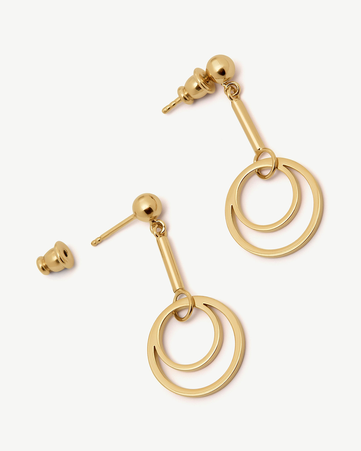 22 carat gold gilded circle drop earrings with two concentric rings and stud posts