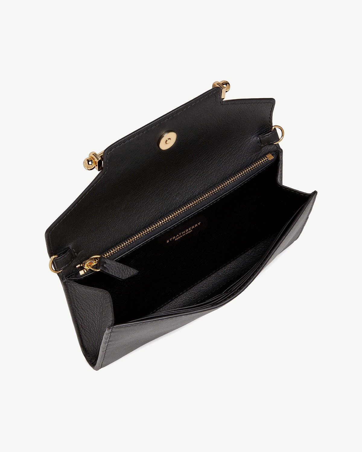 Black Strathberry Multrees chain wallet open showing interior zip pocket and card slots