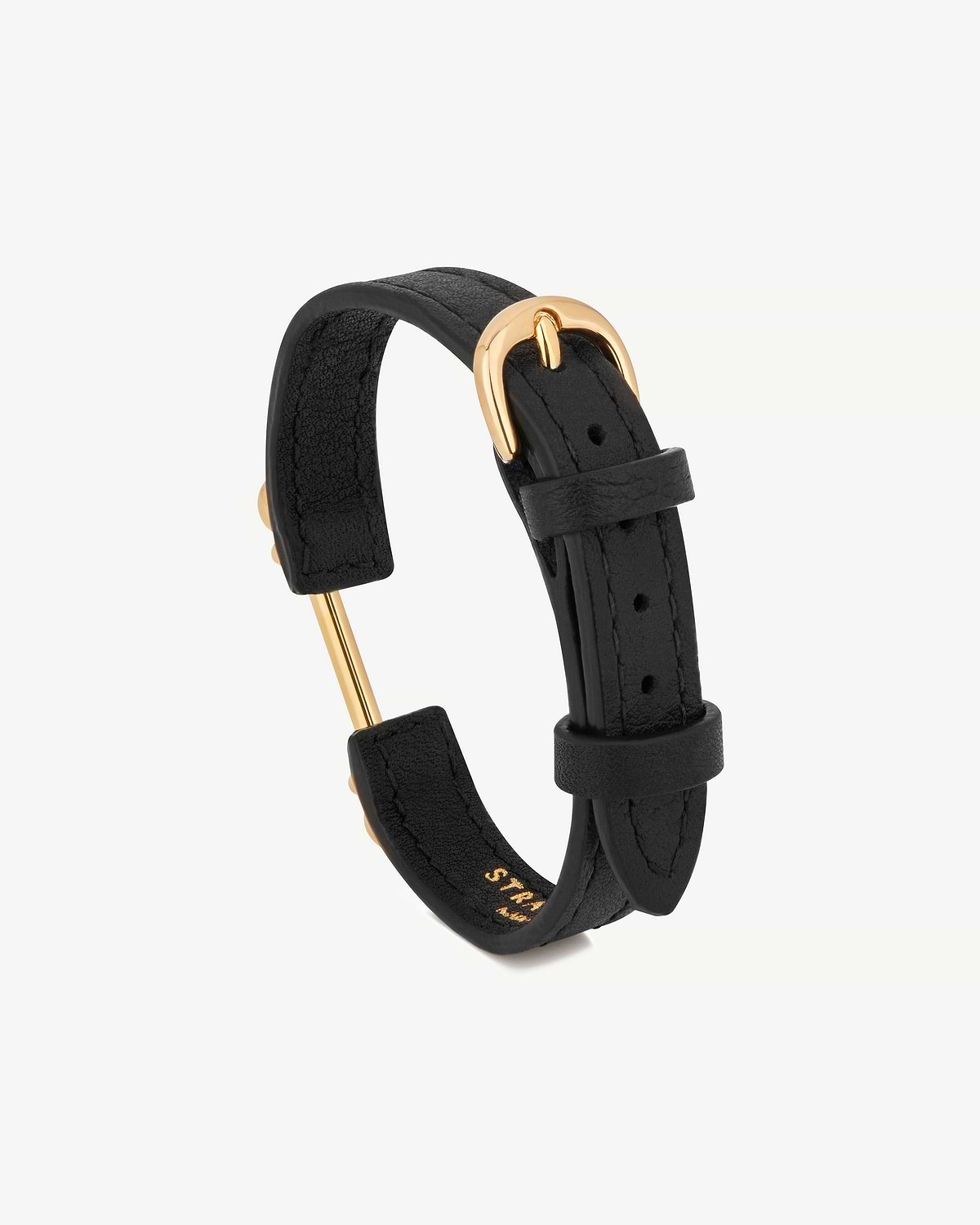 Strathberry black leather bracelet with 22-carat gold bar and buckle.