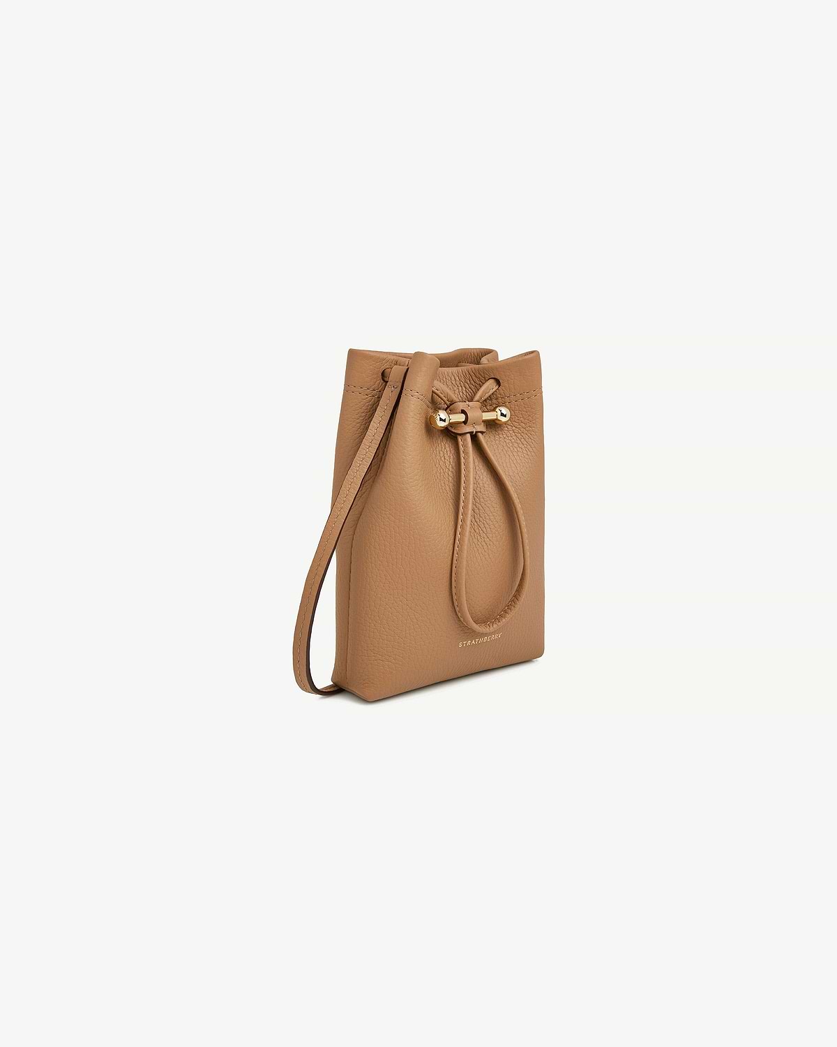 Caramel leather Osette midi pouch with drawstring and embossed Strathberry logo.