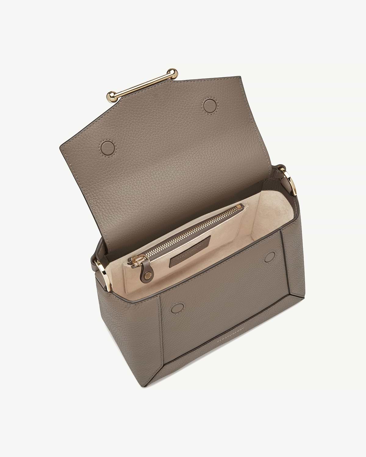 Taupe mosaic bag open showing interior zip pocket and gold hardware.