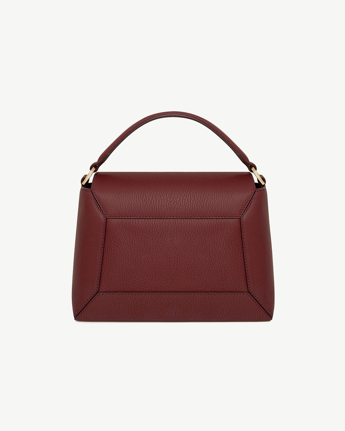 Oxblood pebbled leather mosaic bag with top handle, stitched geometric panels and gold hardware.