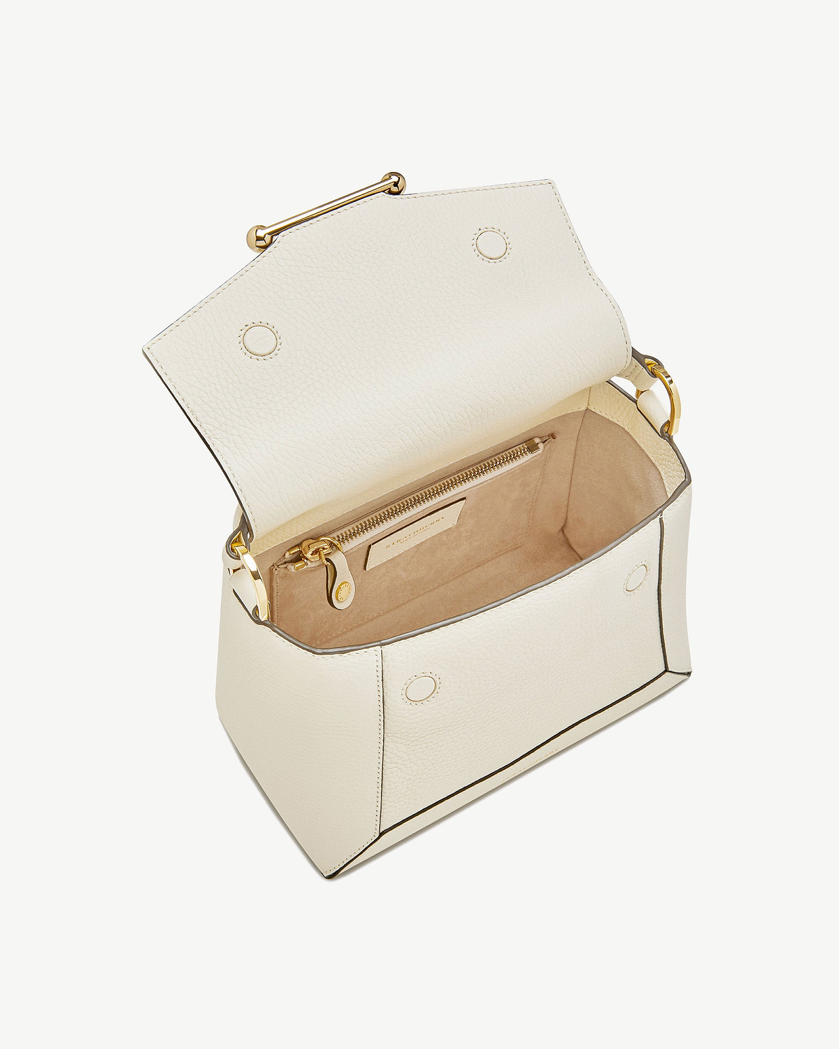Vanilla leather mosaic bag open showing suede interior and zip pocket.