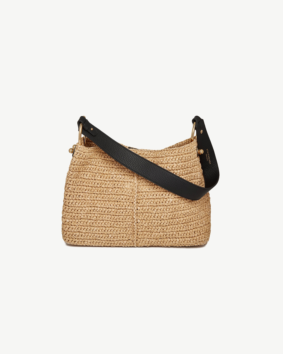 Strathberry Lana hobo bag in raffia with black leather strap and gold hardware.
