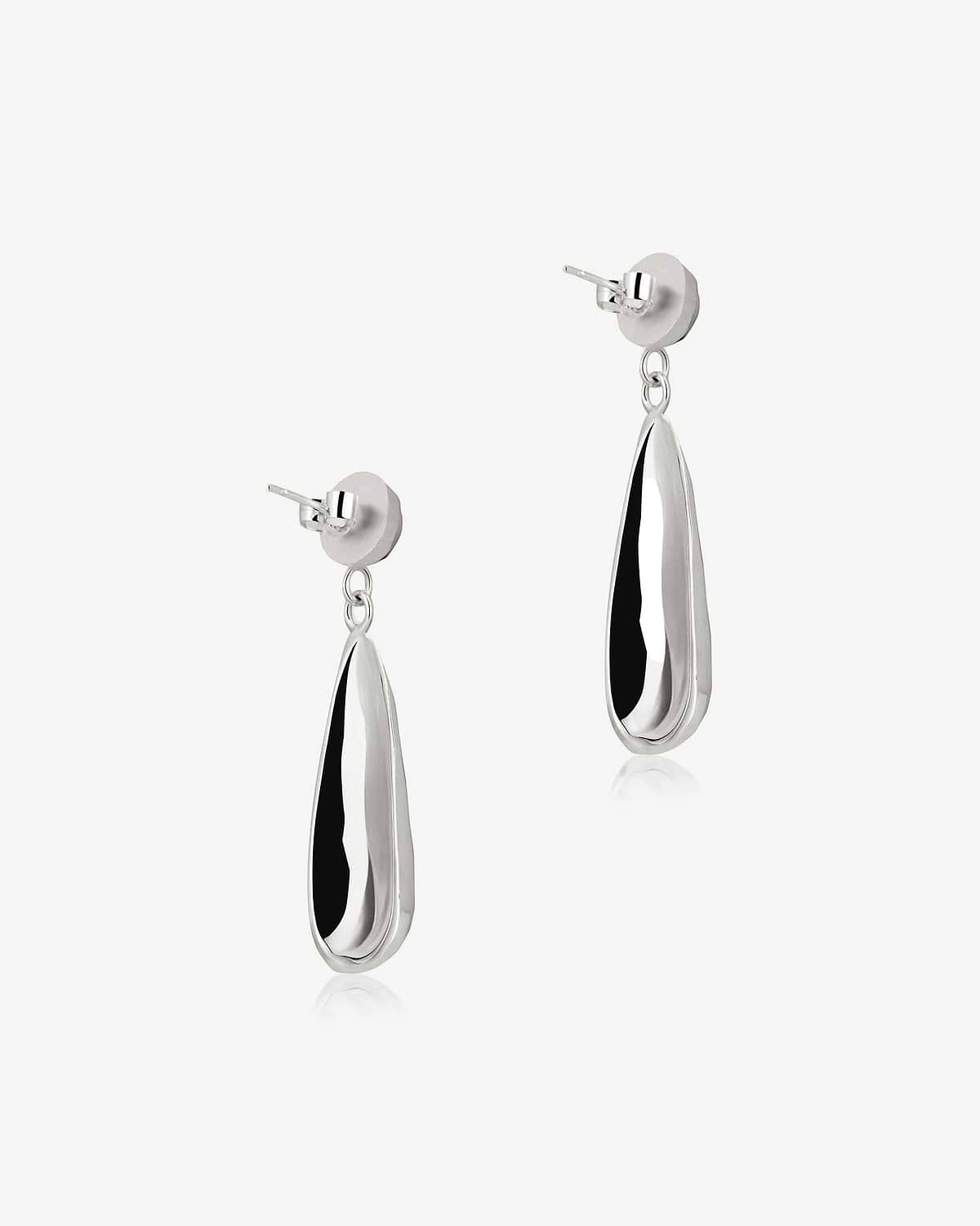 Pair of sterling silver teardrop earrings with polished mirrored surface.