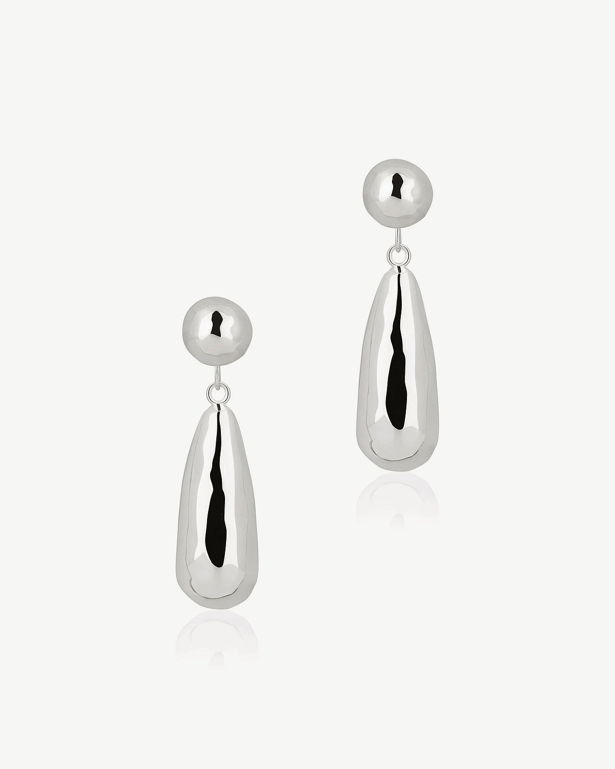 Pair of sterling silver teardrop earrings with ball studs, reflective finish.