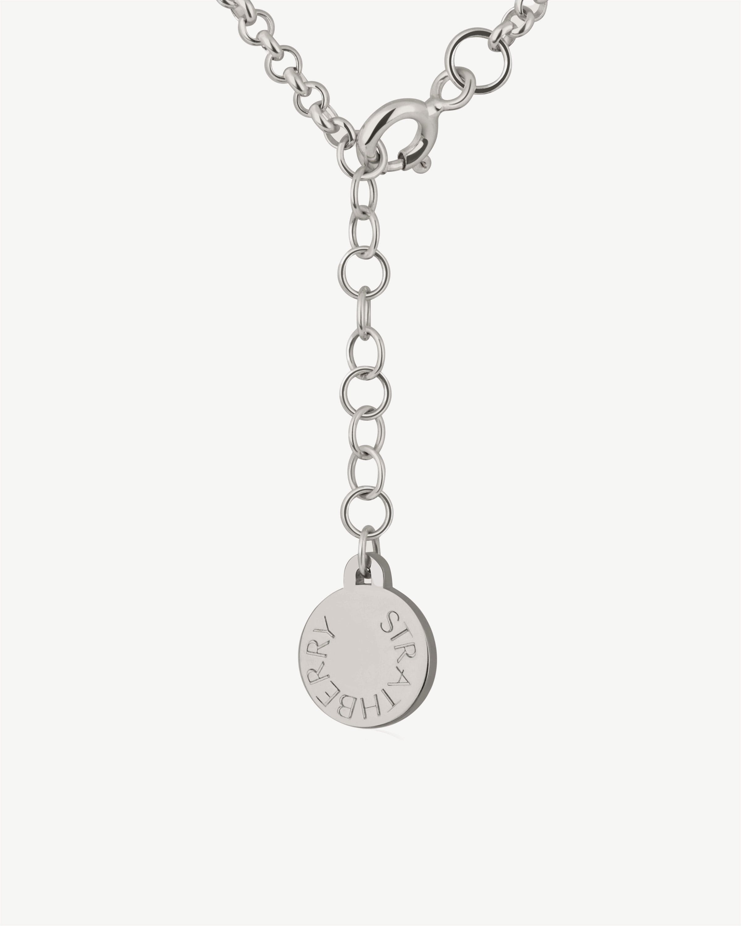 Sterling silver chain with round Strathberry tag and adjustable extender