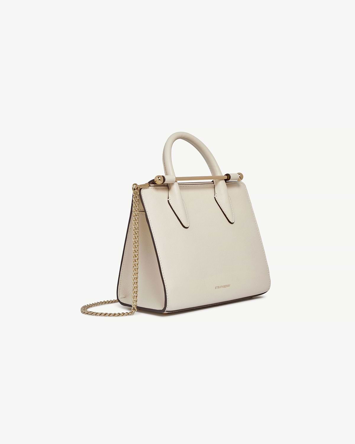 Vanilla mini tote with top handle, gold bar detail and chain strap, Strathberry.