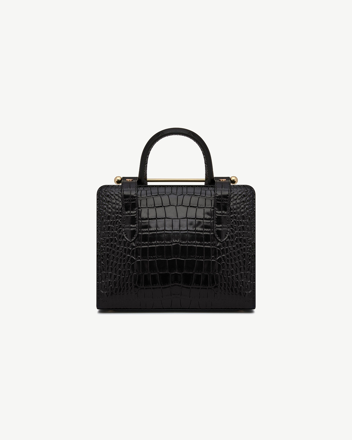 Black croc mini tote with single top handle and gold bar detail.