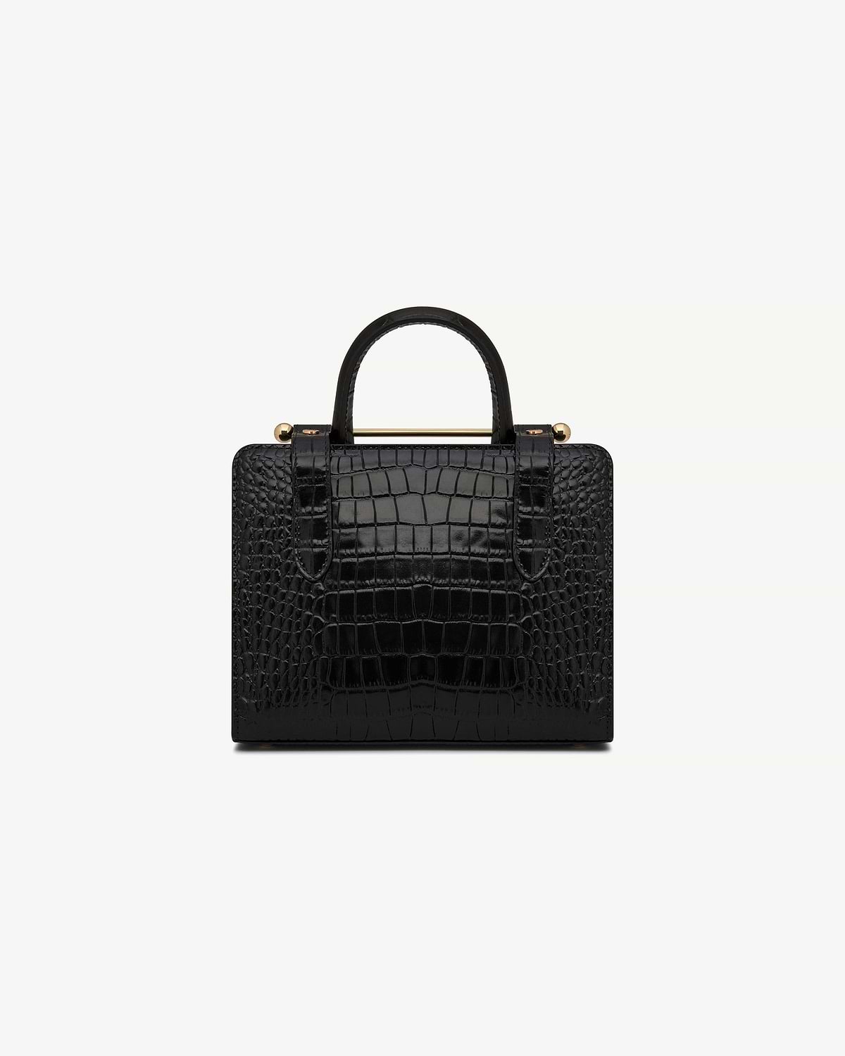 Black croc mini tote with single top handle and gold bar detail.