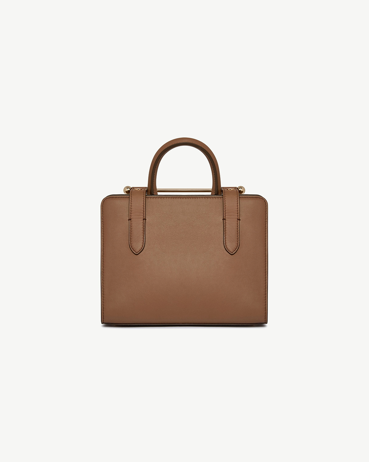 Mini tote in clay leather, front view showing top handles, straps and gold hardware.