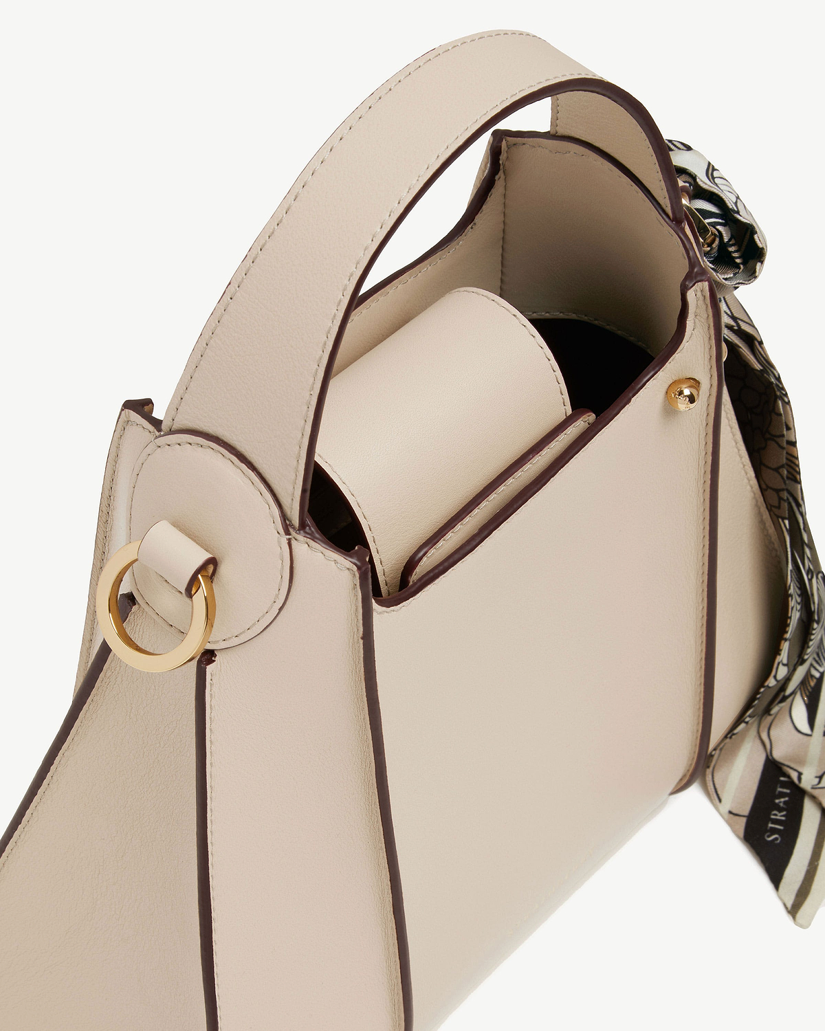 Arkshell oat top-handle bag with gold ring and patterned scarf
