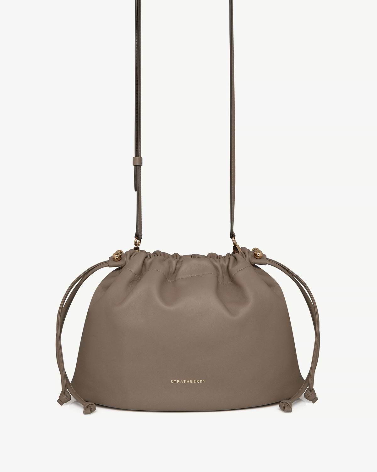 Strathberry Charlotte Midi drawstring bag in taupe leather with adjustable strap