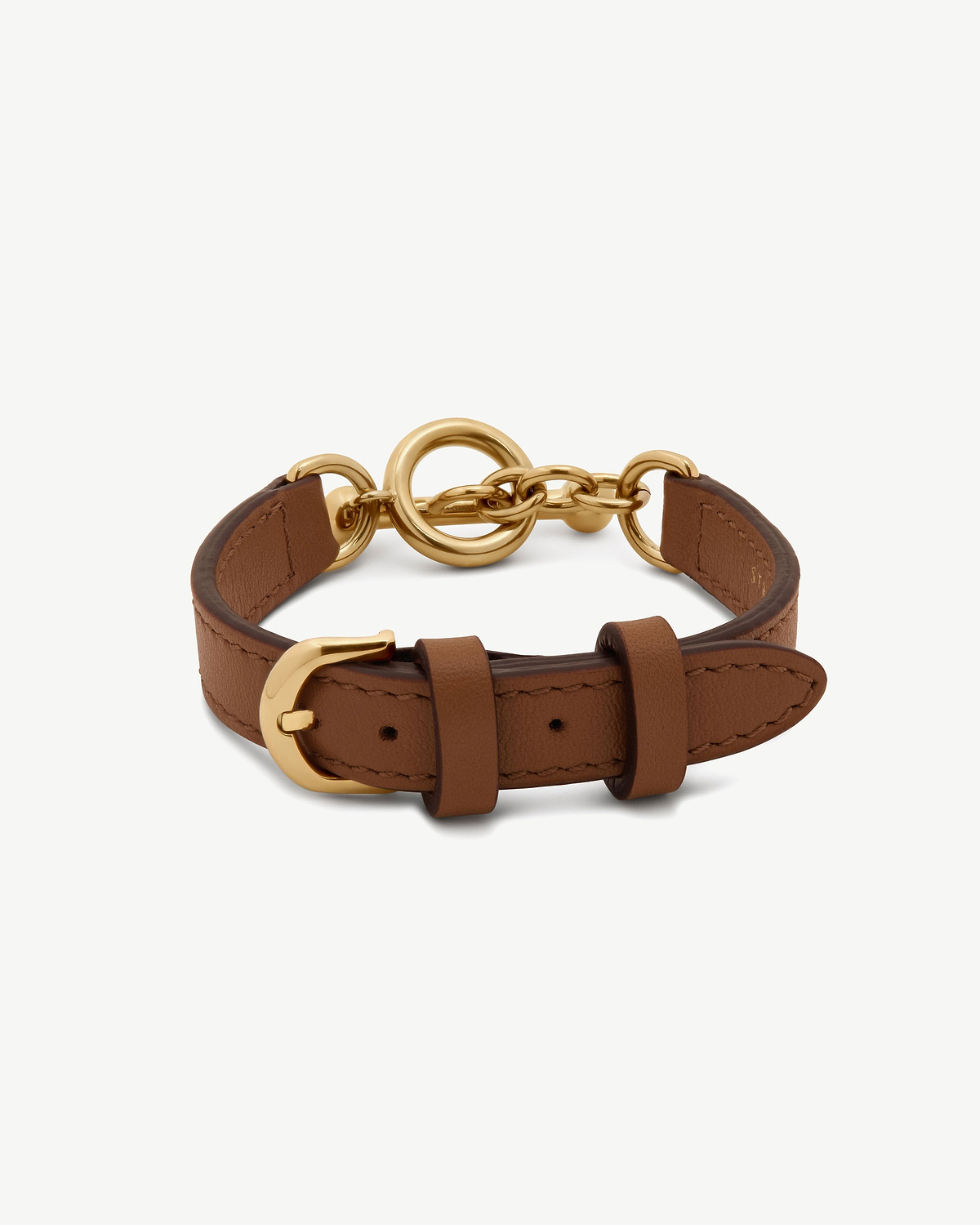 Tan leather bracelet with gold ring toggle and buckle fastening.