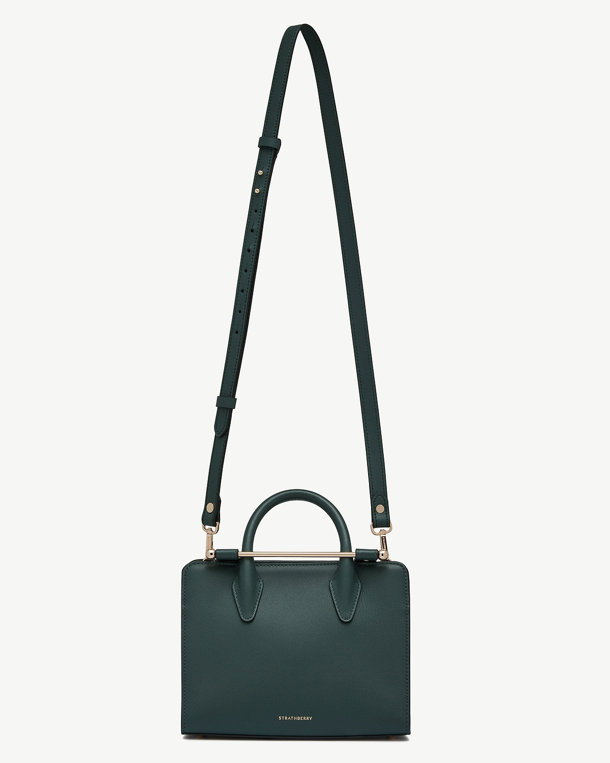 Bottle green leather bag with thin adjustable strap, top handle and gold bar, Strathberry