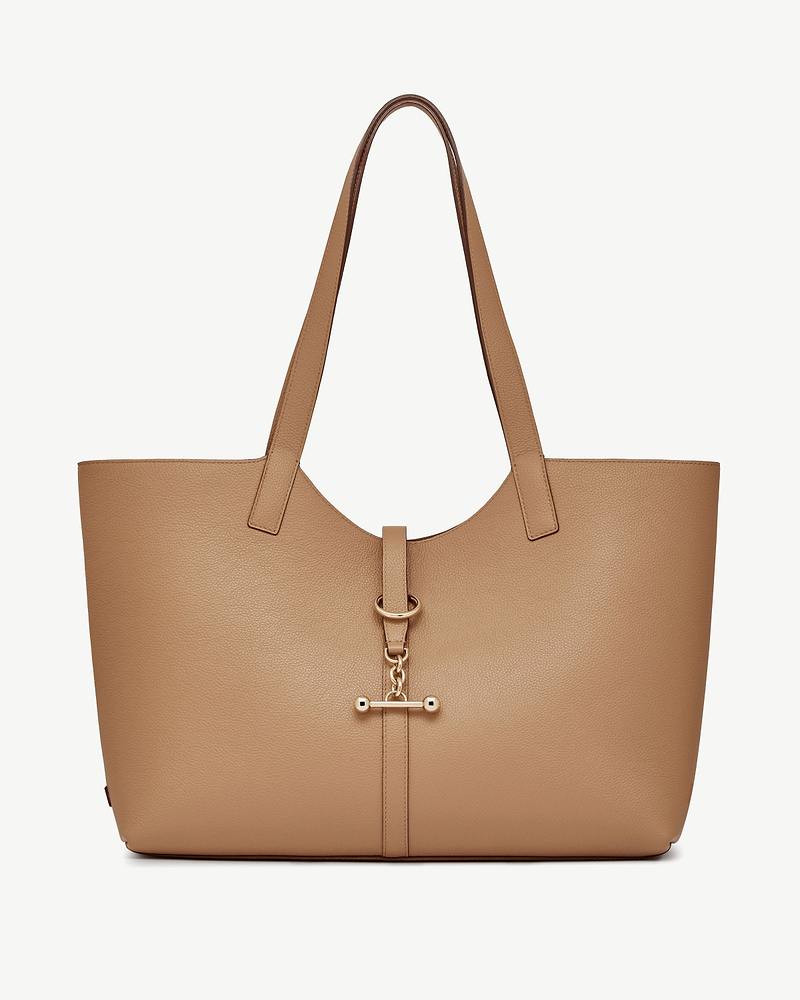 Caramel leather kite tote with two shoulder straps and gold bar hardware.