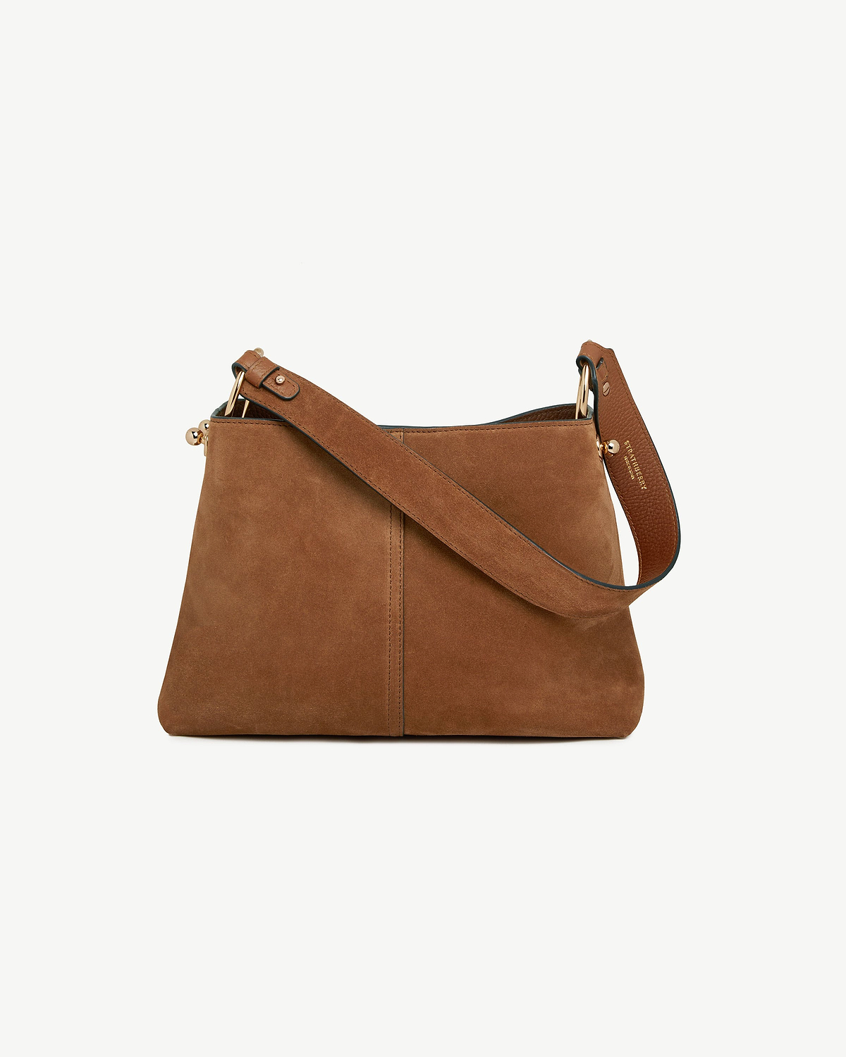 Tan suede Lana hobo bag with wide strap, gold hardware, Strathberry logo.