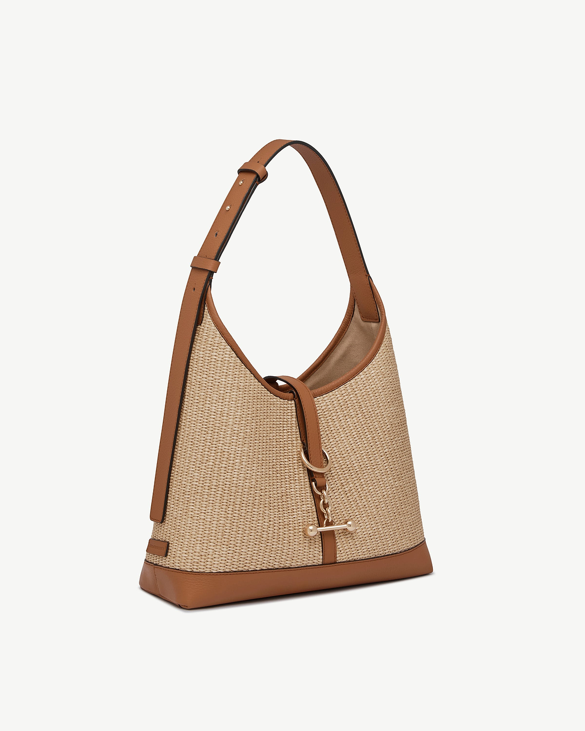 Tan and natural raffia kite hobo bag with leather trim and gold hardware.