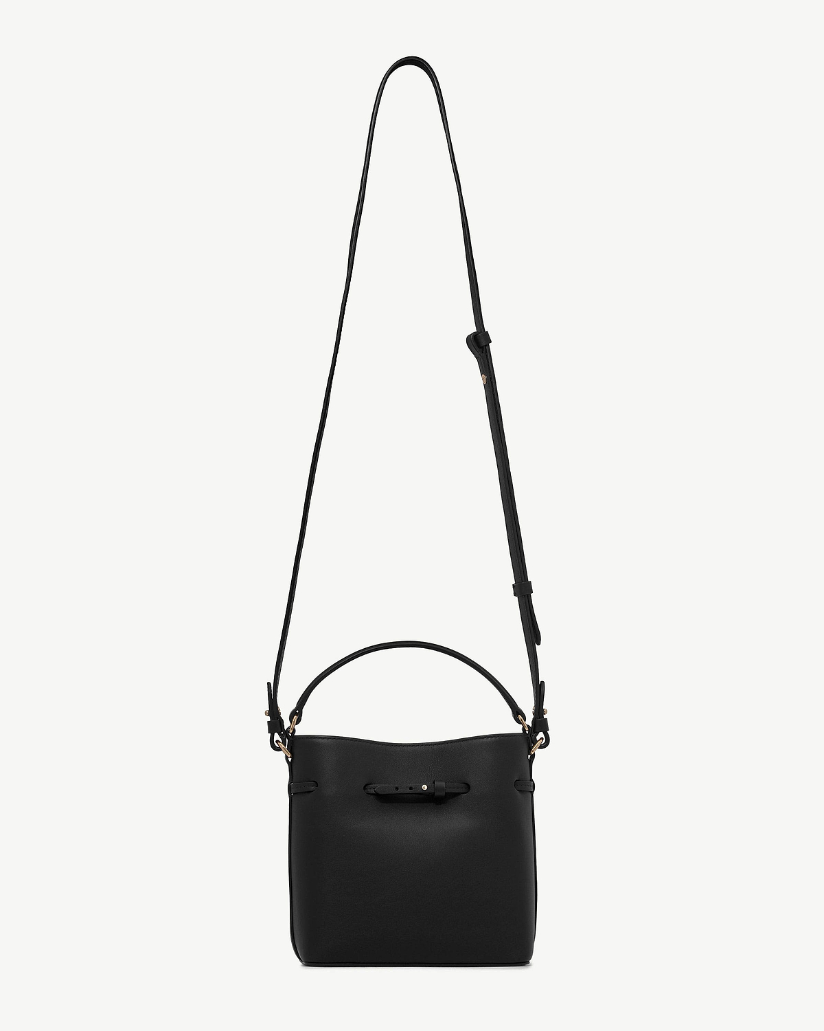 Black bucket mini bag with top handle, adjustable shoulder strap, front buckle detail.