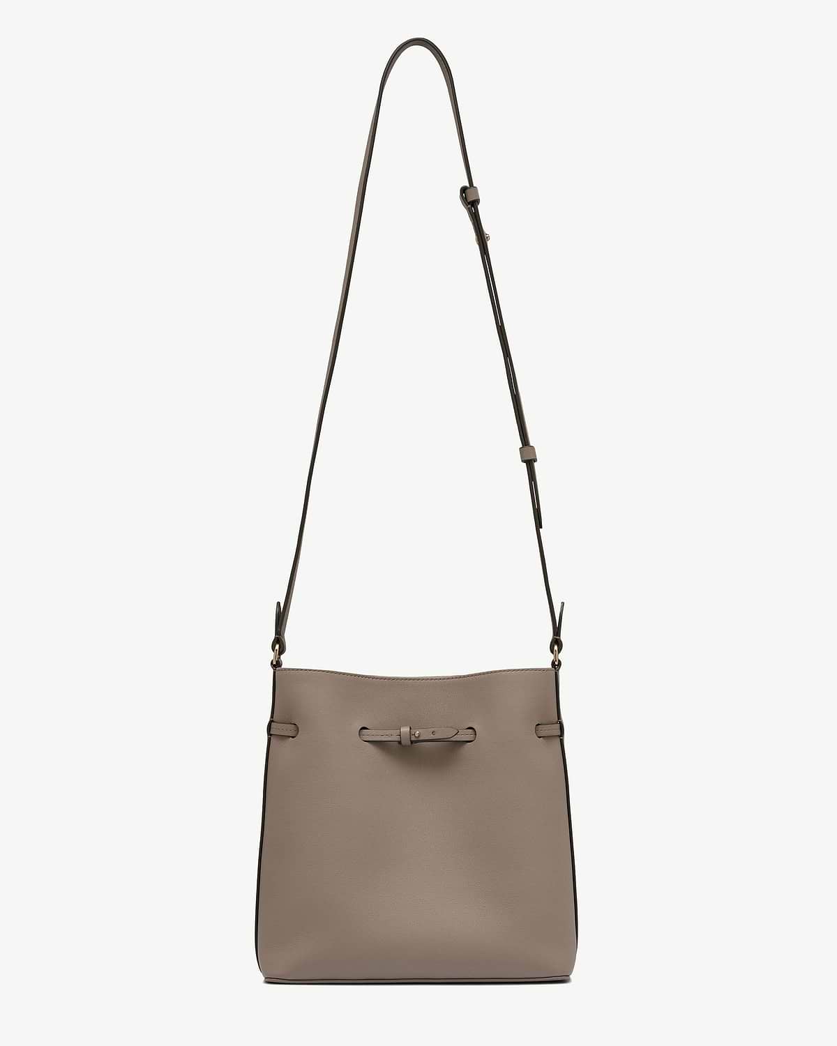 Taupe bucket bag with adjustable shoulder strap and front knot detail.