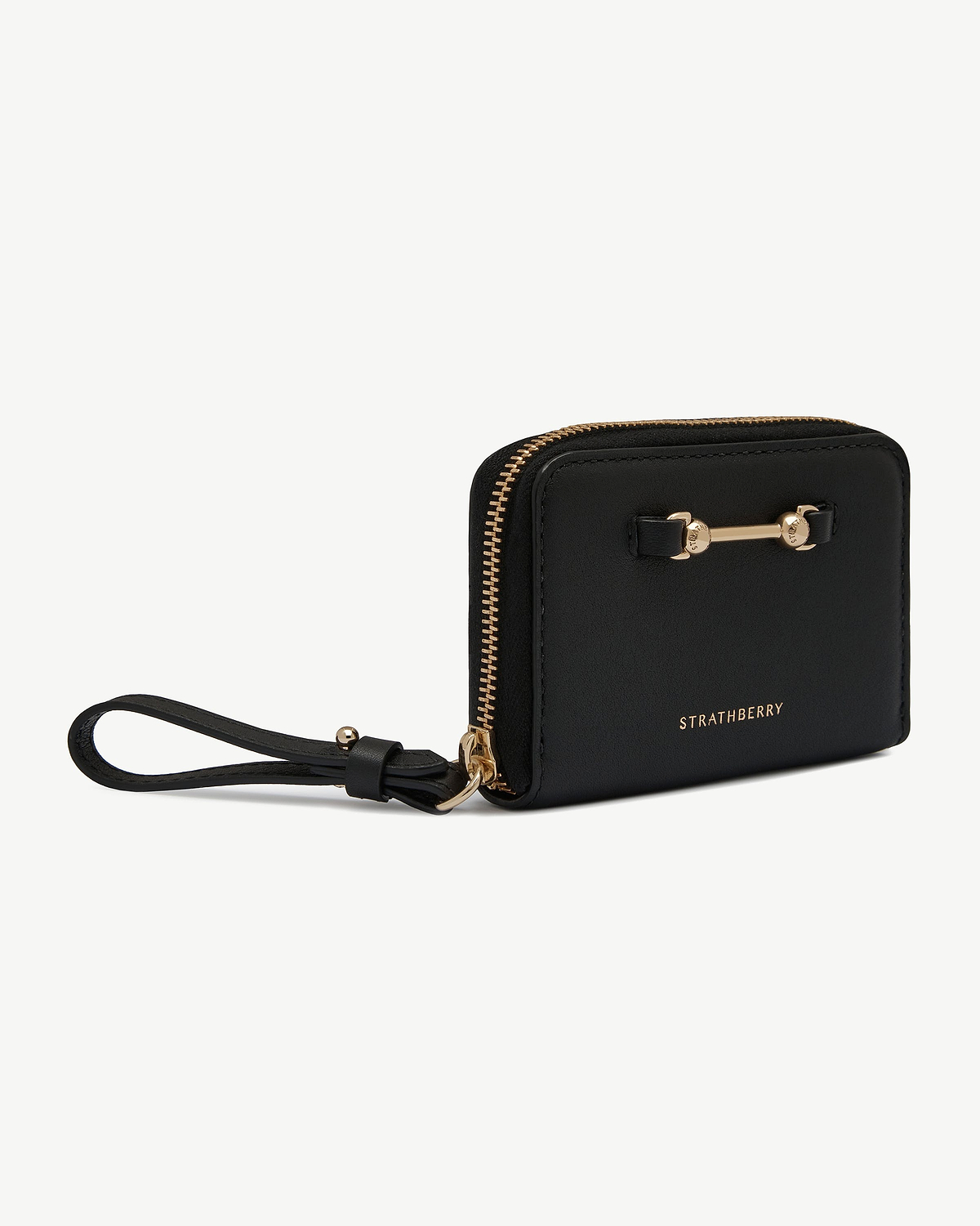 Black zip-around wallet with wrist strap, gold hardware and Strathberry logo.