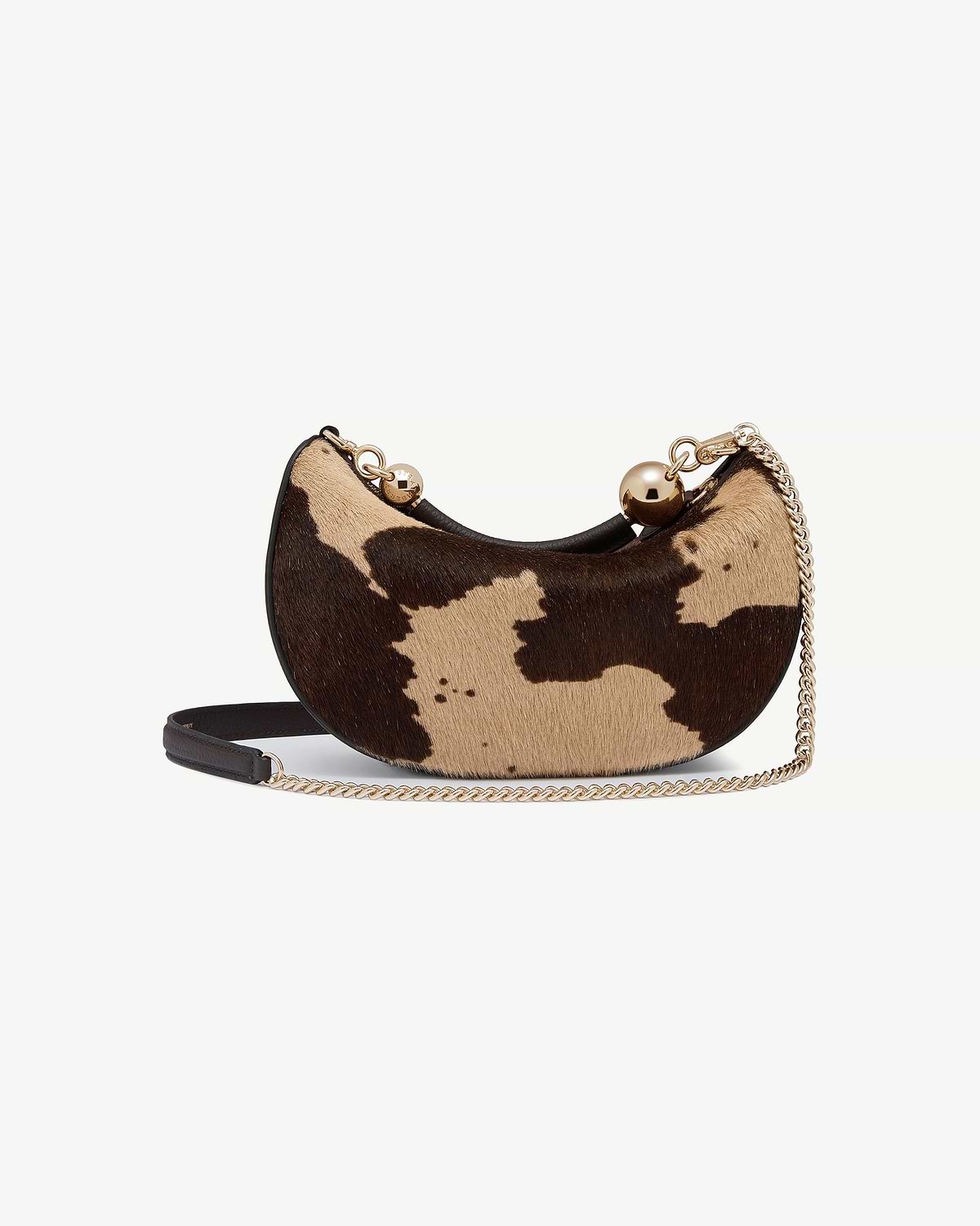 Crescent mini bag in sand and espresso spot haircalf with gold chain.