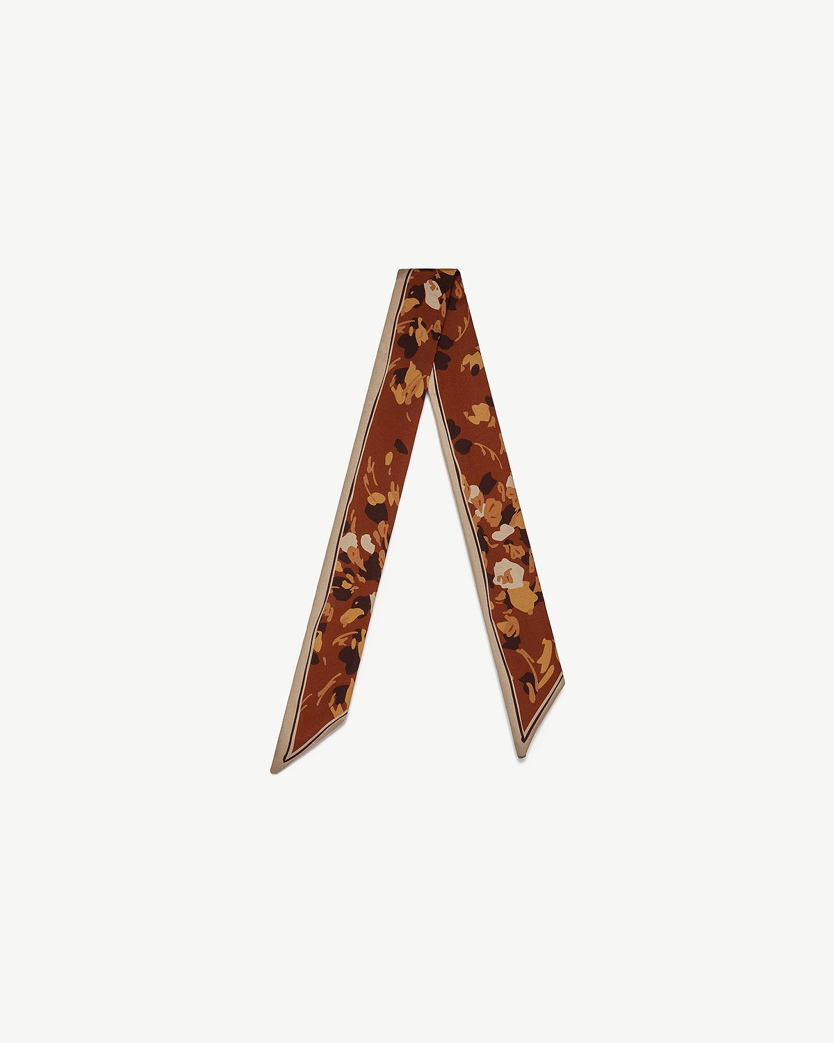 Silk skinny scarf in sand and oxblood with pop flower print, arranged in V shape.