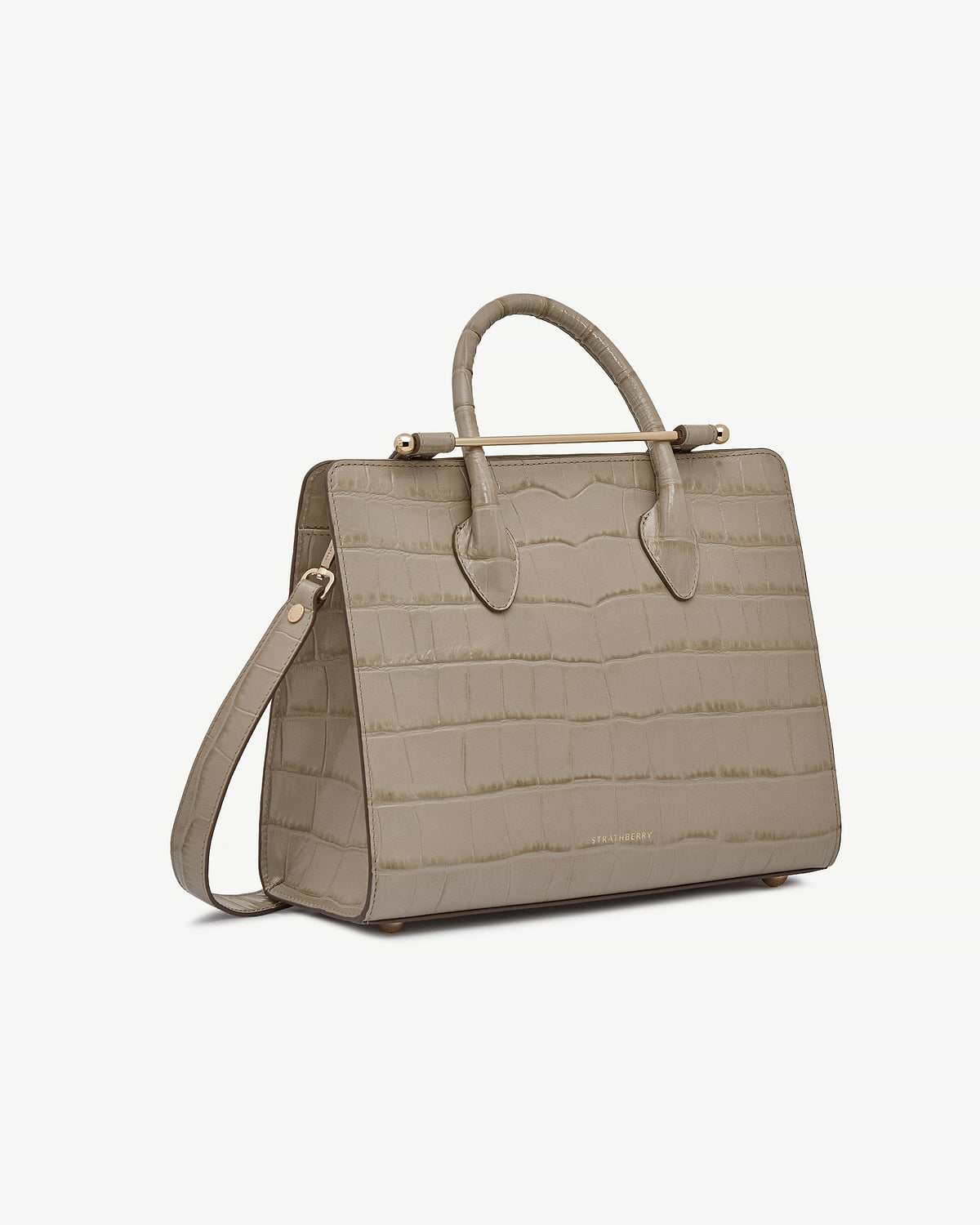 Strathberry croc-embossed midi tote with top handles and detachable shoulder strap.