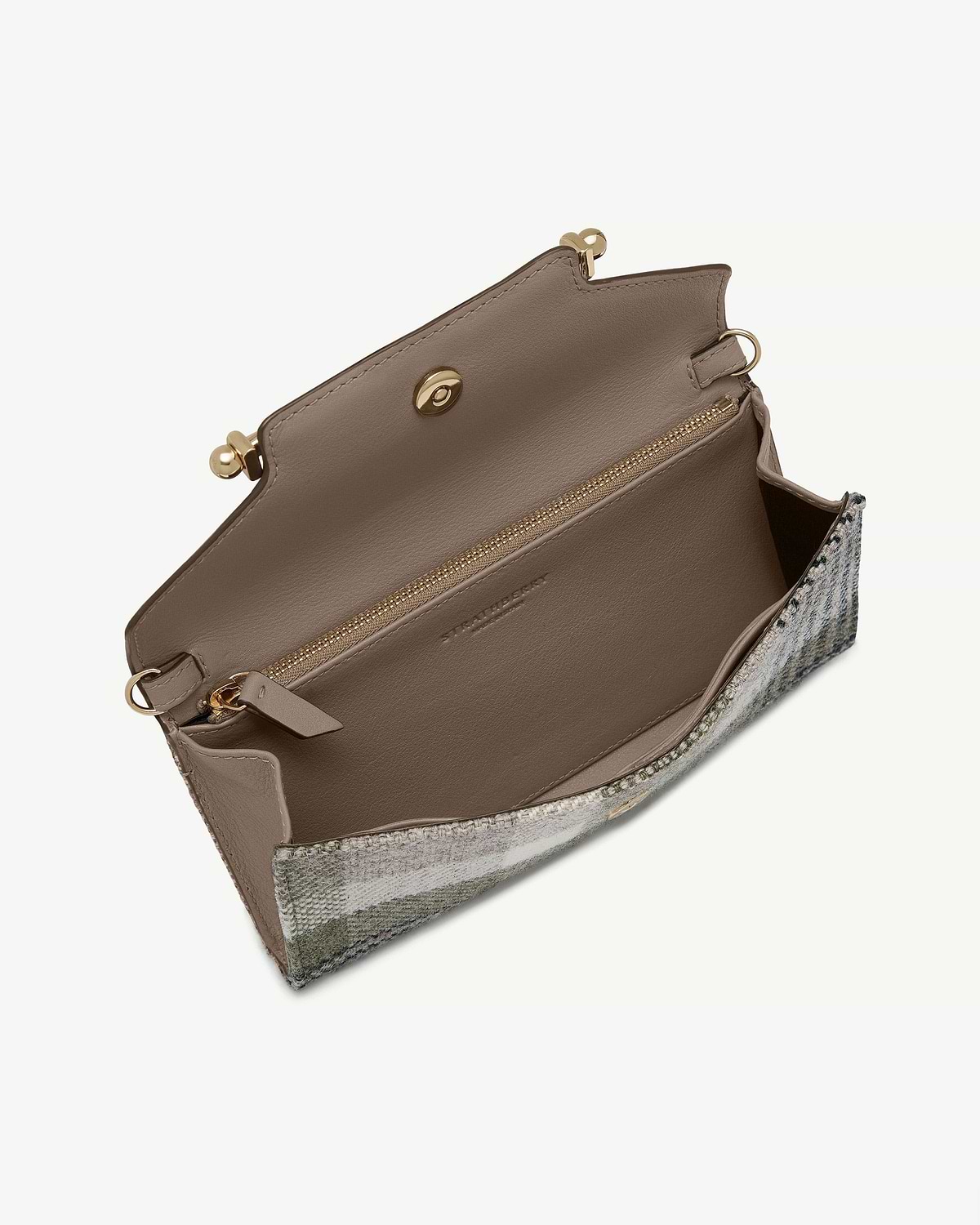 Open Strathberry Multrees chain wallet in tartan taupe showing internal zip pocket and snap closure