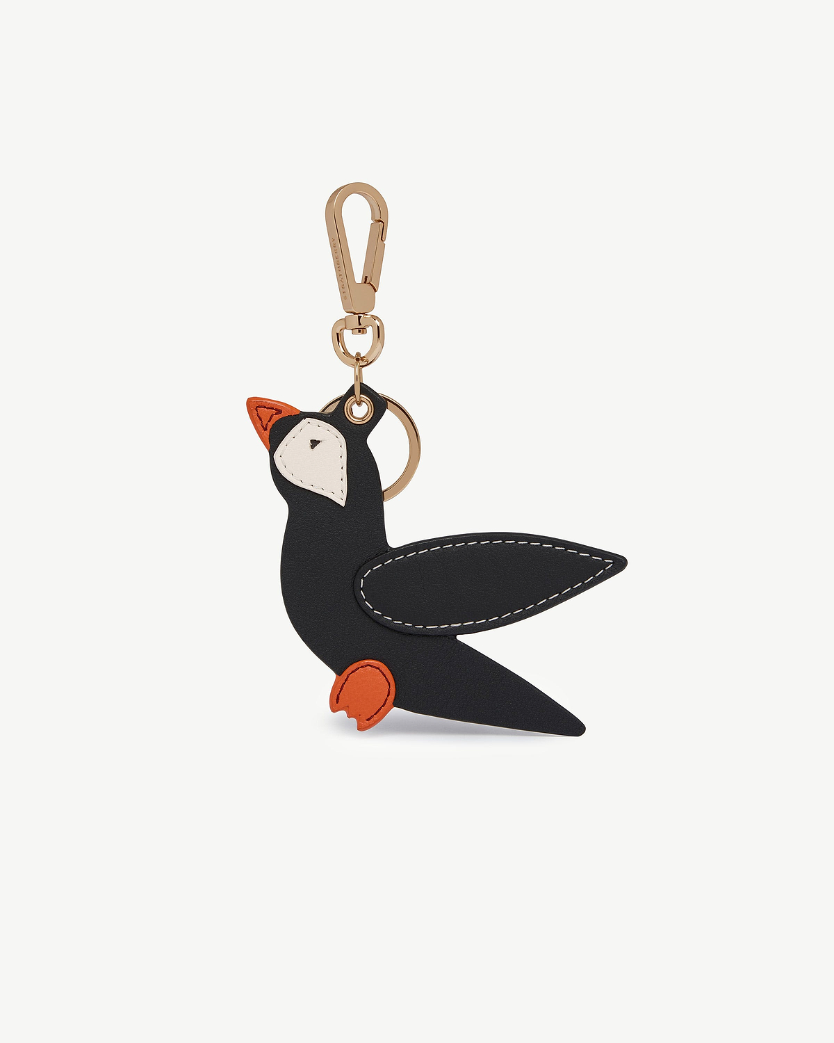 Puffin-shaped bag charm in black, vanilla and marmalade leather with gold-tone clasp