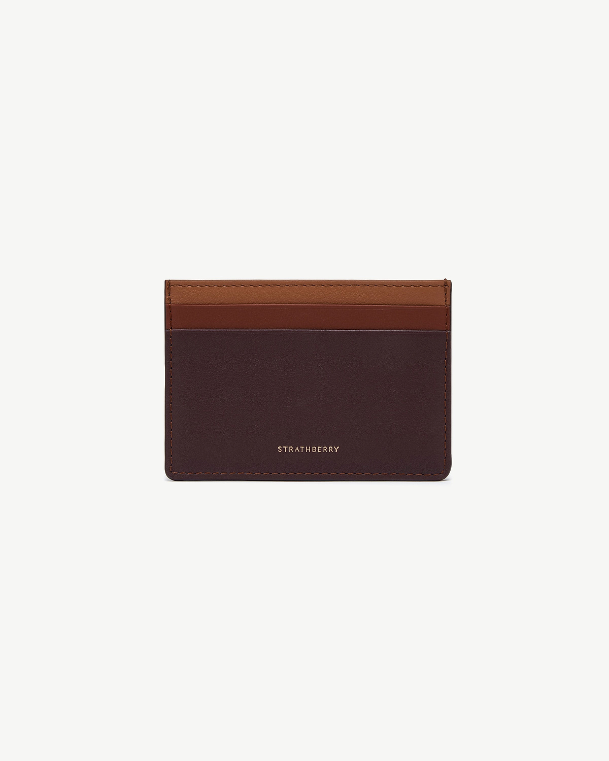 Front view burgundy, walnut and chestnut leather cardholder with Strathberry logo.