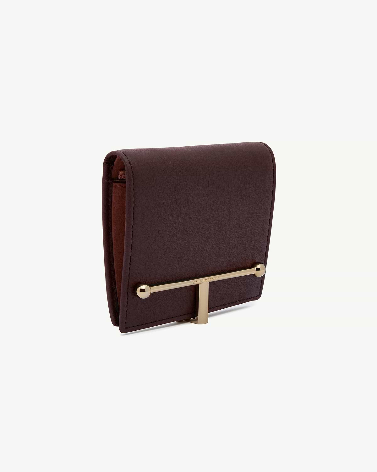 Burgundy and walnut leather wallet close-up showing gold T-bar hardware.