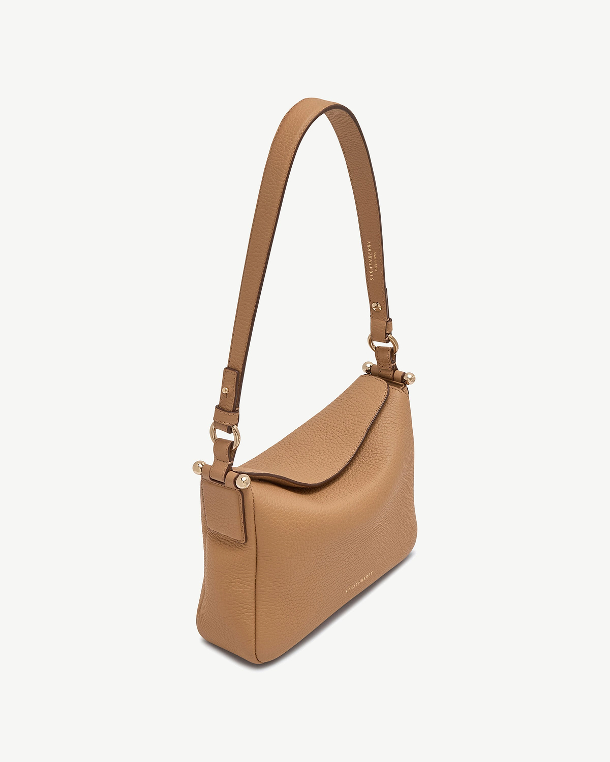 Strathberry Sway shoulder bag in caramel leather with top flap and gold hardware
