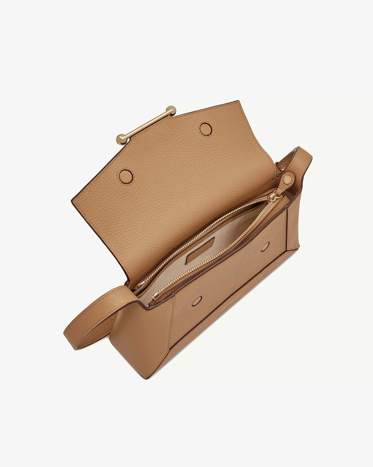 Caramel leather shoulder bag with top flap open showing zip compartment