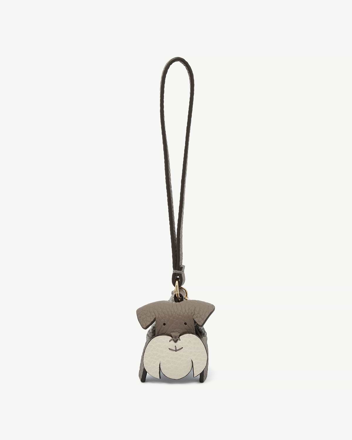 Small dog-shaped grey tartan leather bag charm with strap and gold ring.