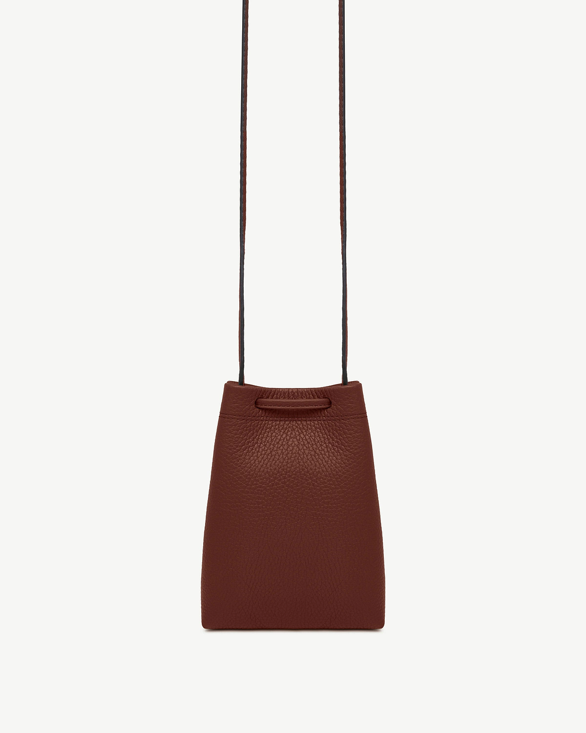 Walnut leather midi pouch with long thin strap and pebbled texture.