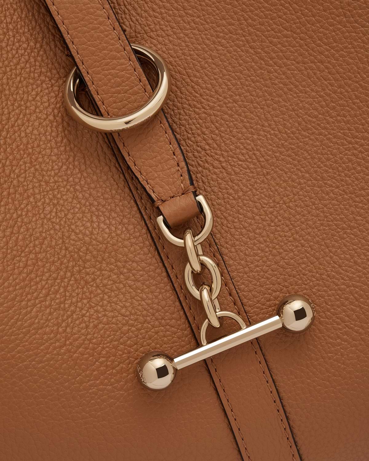 Tan pebbled leather bag strap with gold chain and bar clasp