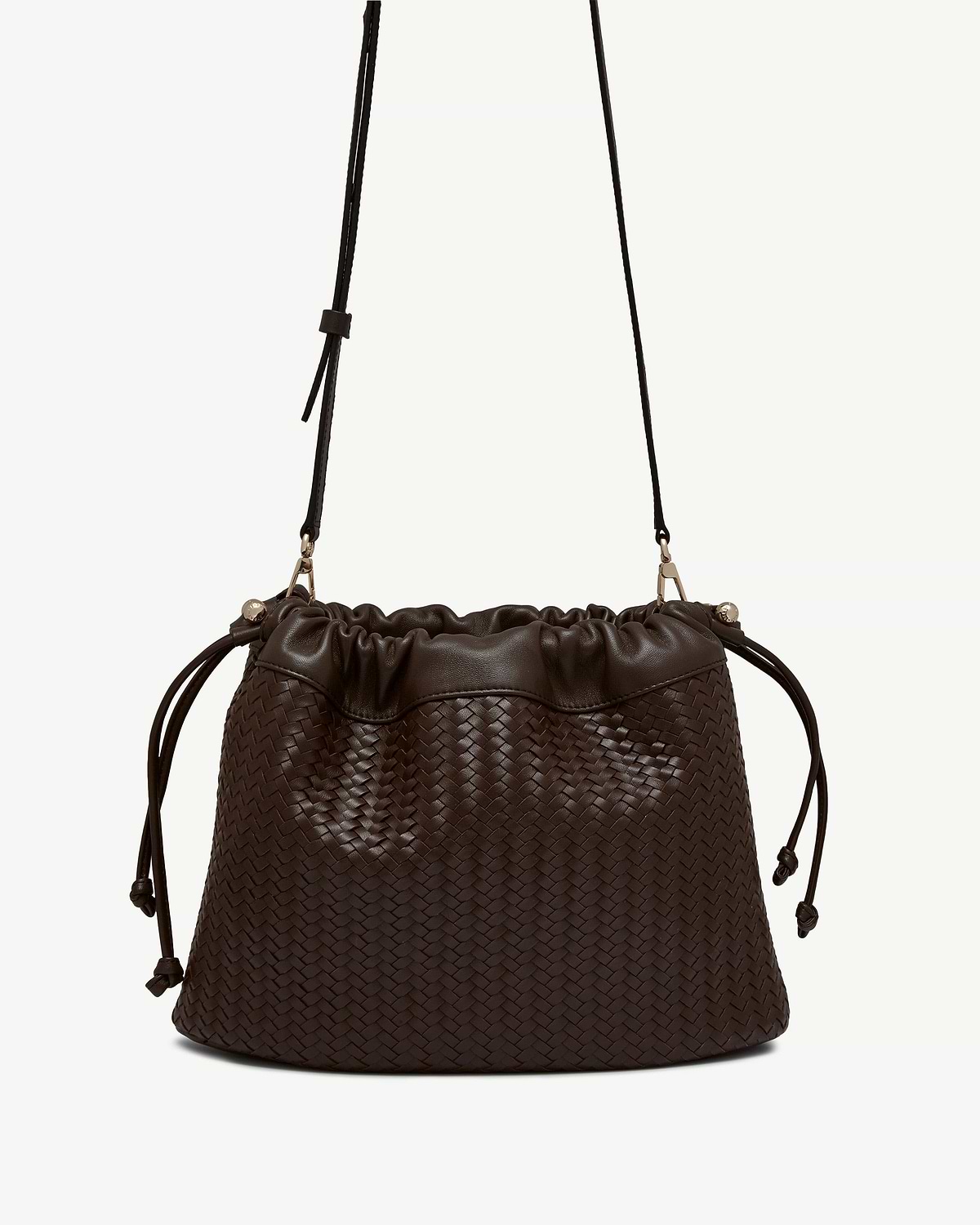 Chocolate woven leather drawstring bucket bag with long shoulder strap.