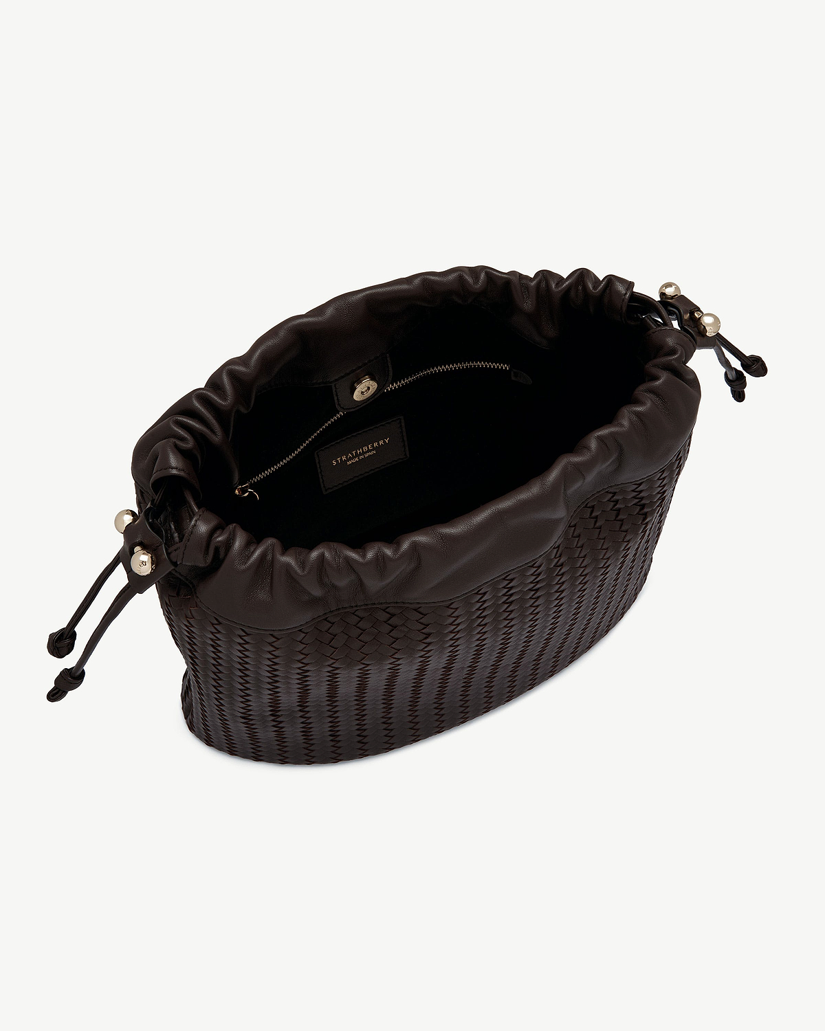 Strathberry Charlotte Midi drawstring bag in chocolate woven leather, open top view.