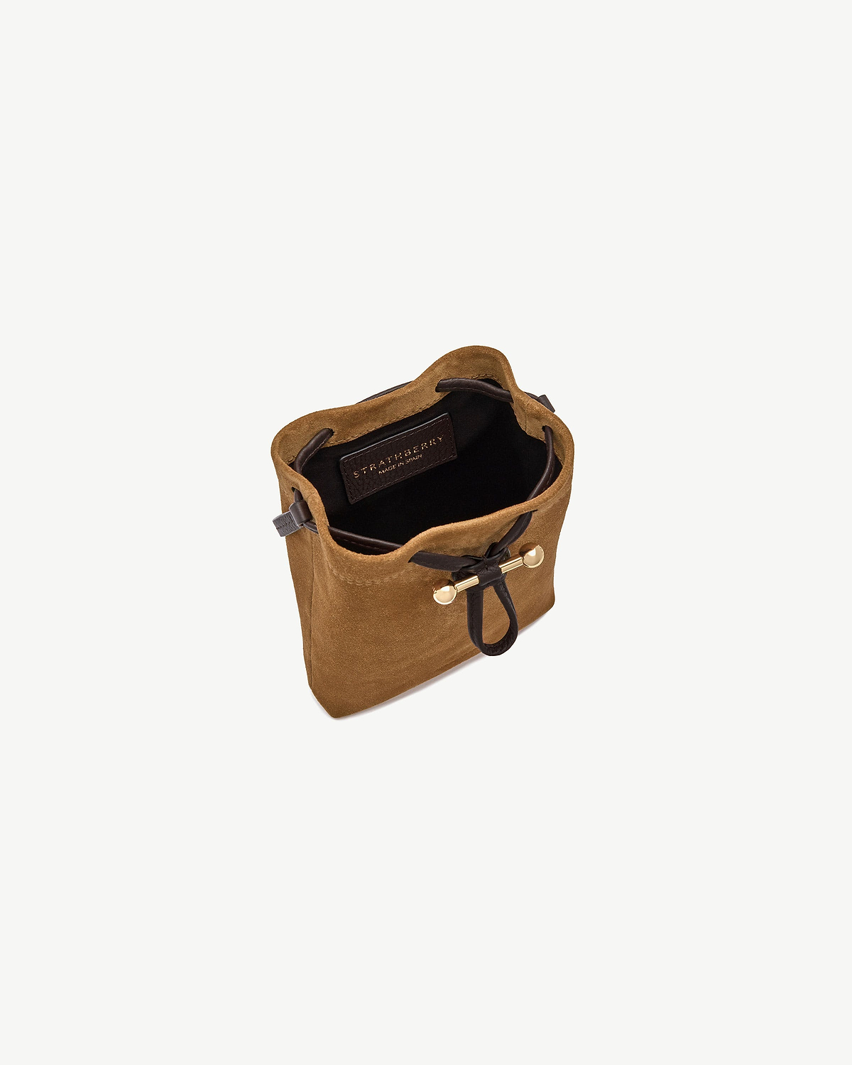 Toffee suede Osette midi pouch with espresso drawstring and Strathberry label inside.