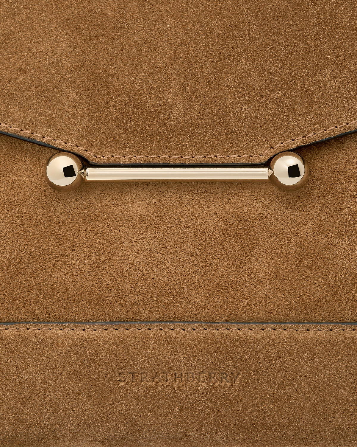 Toffee suede mosaic bag showing gold bar hardware and embossed Strathberry logo