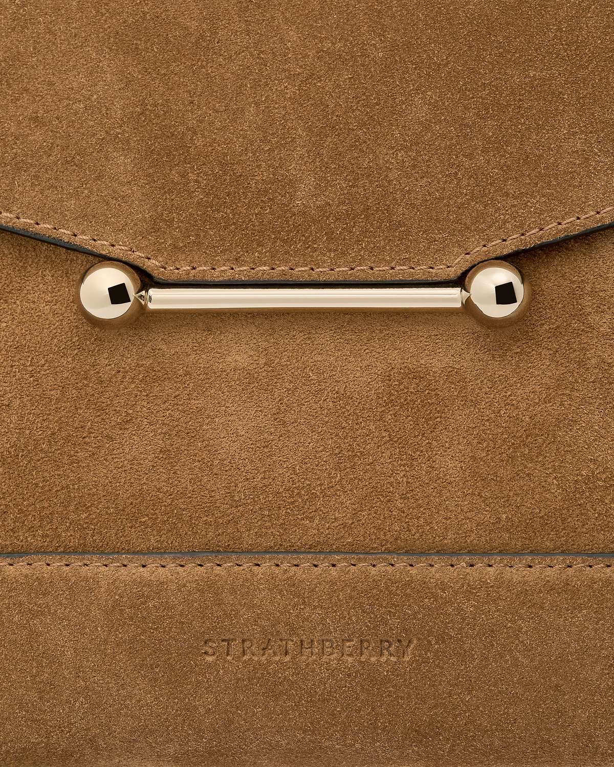 Toffee suede mosaic bag showing gold bar hardware and embossed Strathberry logo