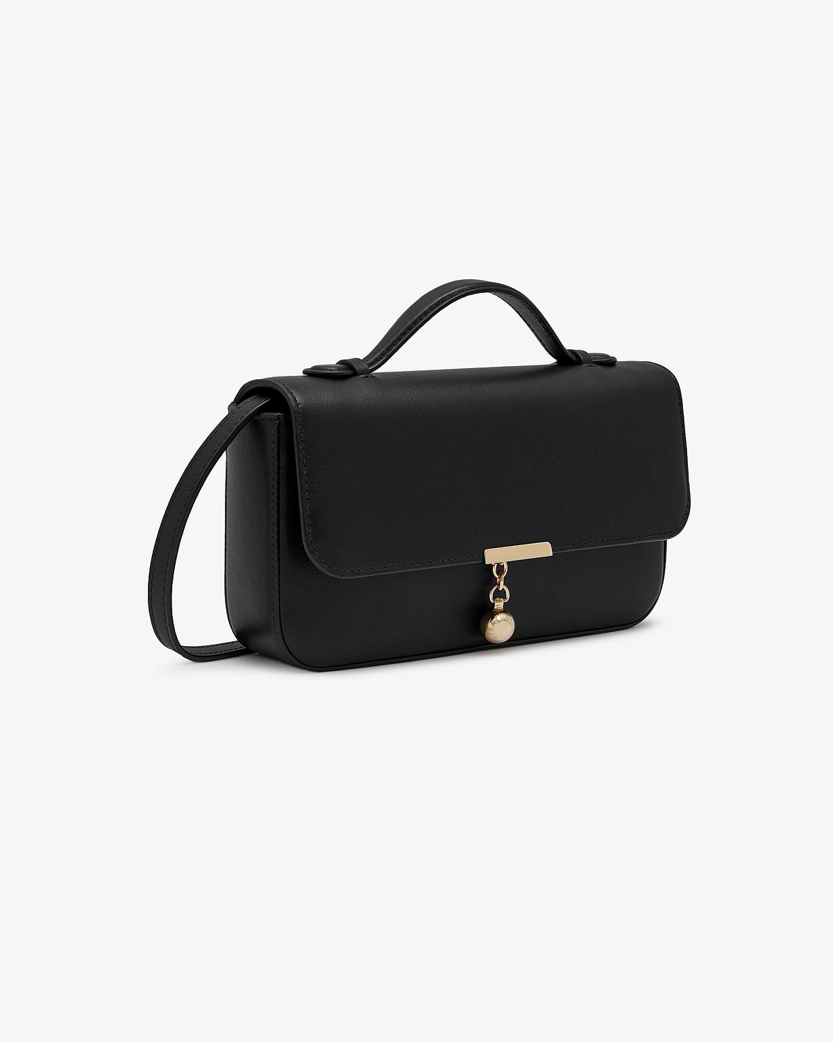 Black clutch with top handle, shoulder strap and gold charm.