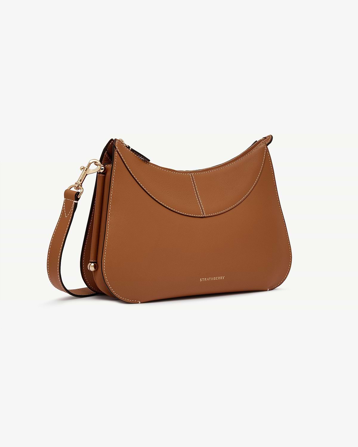 Tan Nest shoulder bag with strap, contrast stitching, gold hardware and Strathberry logo.