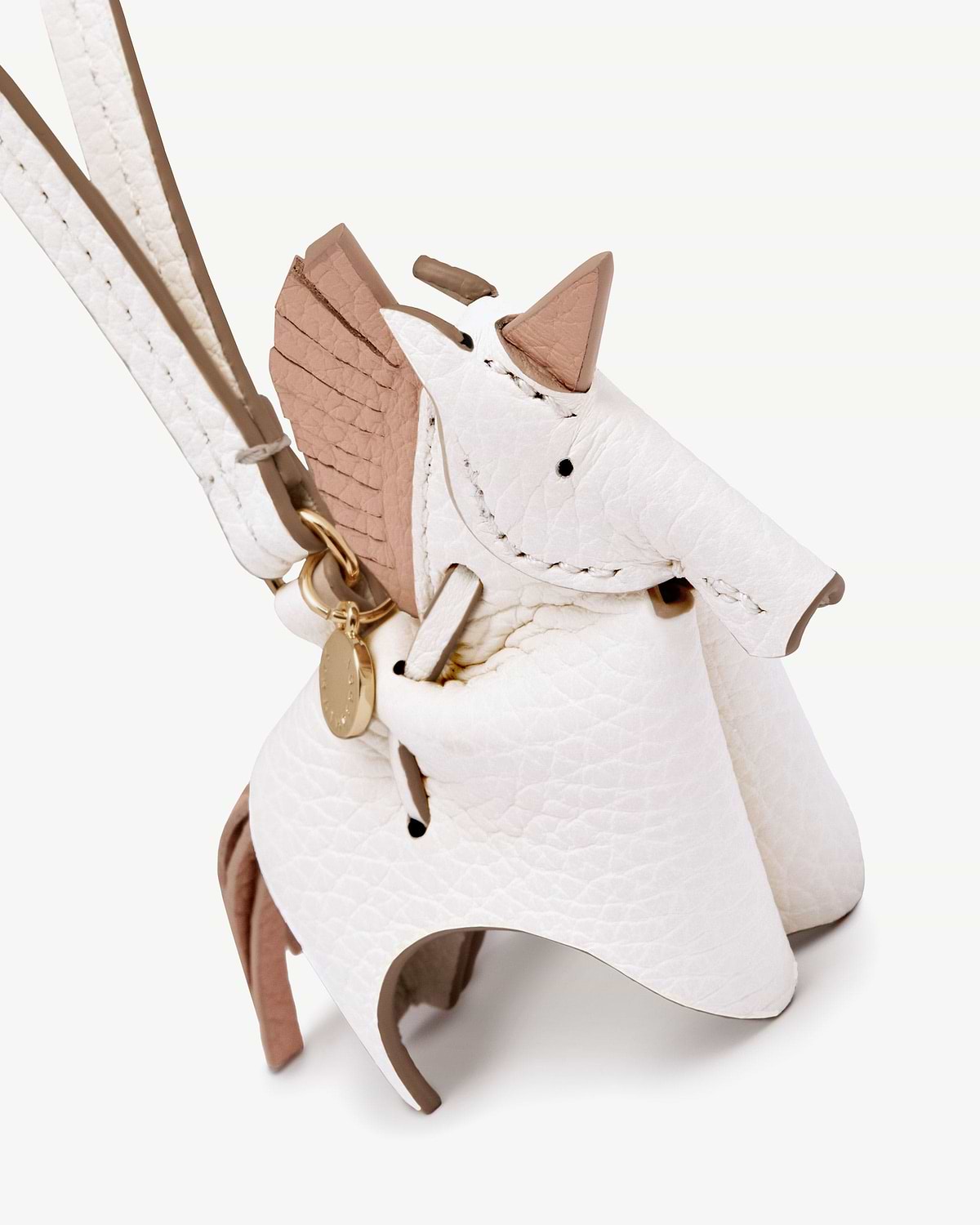 White and peony unicorn leather bag charm with gold ring and strap.