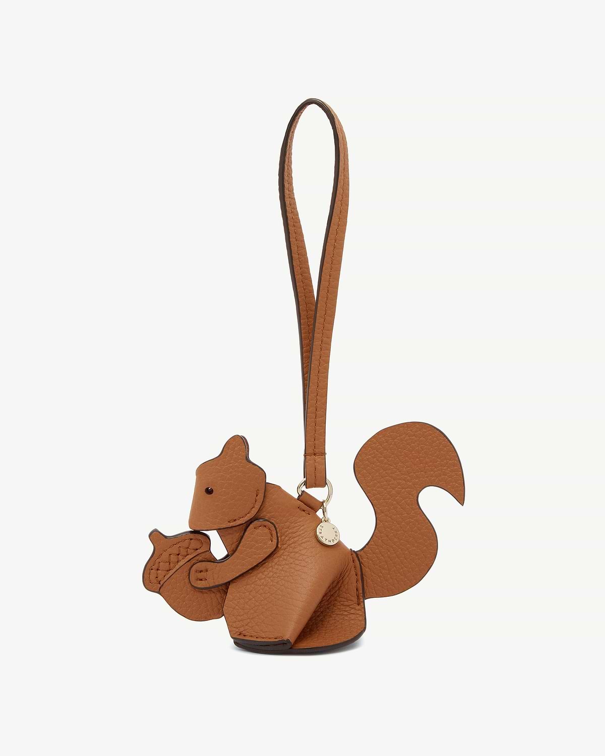 Tan squirrel leather bag charm shaped like a squirrel with strap and gold tag